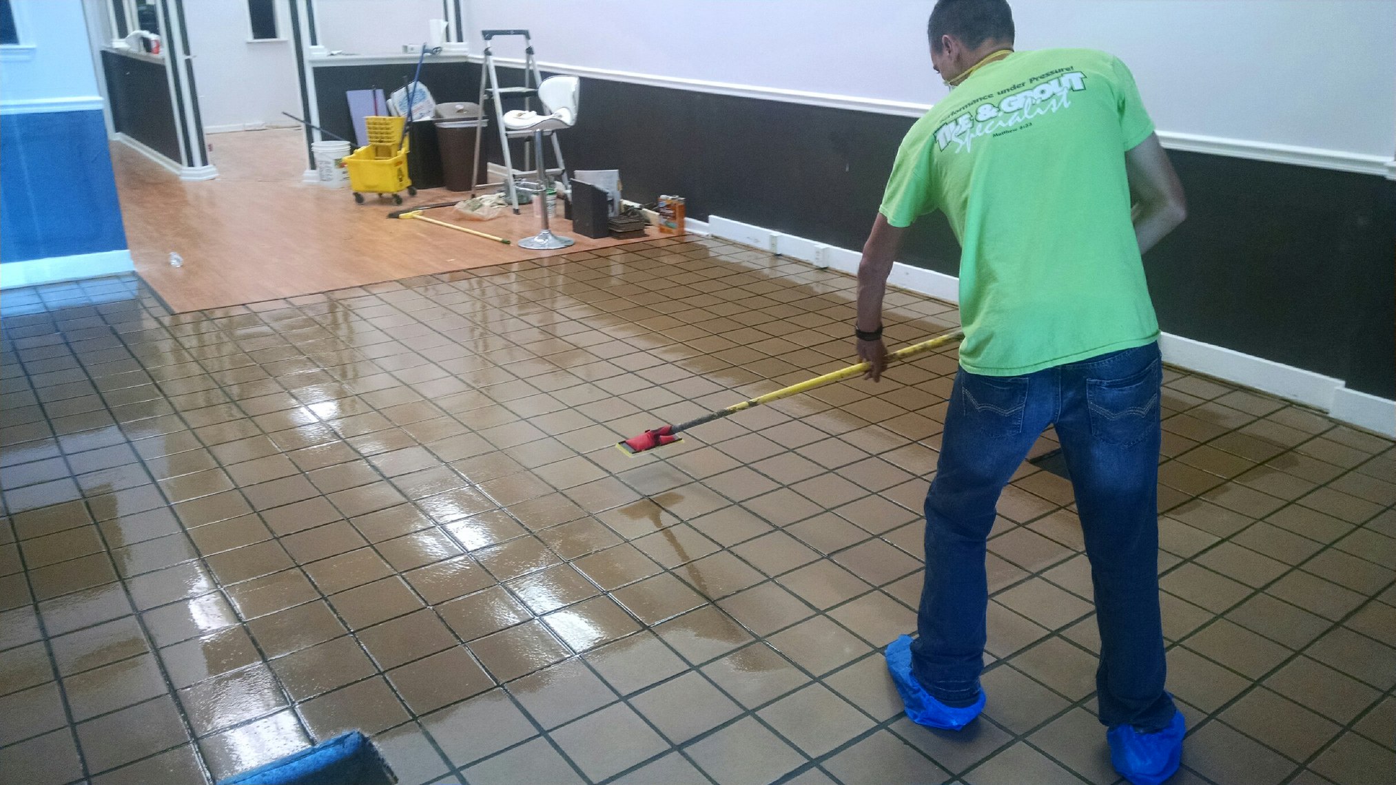 Travis Benton at work performing professional floor restoration